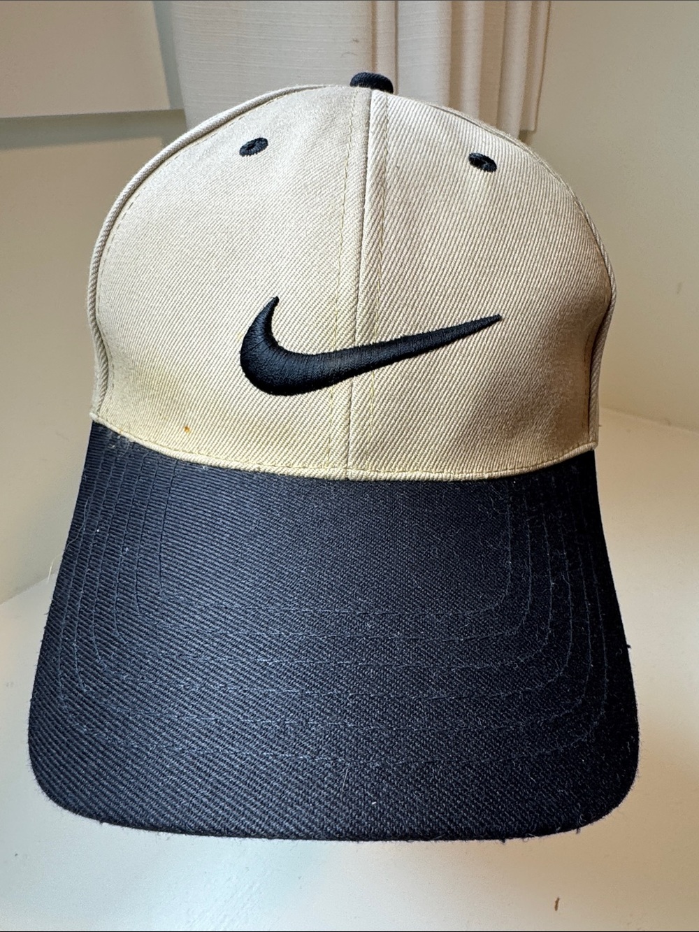 Nike tan and black ball cap. OS.